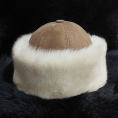 "Leather and fur is used for long centuries by Turks. They are mostly used to keep bodies warm. As having a continental climate into the Anatolian region, leather and fur hats were essential outfits with a special name \"börk\". Moreover, these hats were adapted to the apparel of these days. The Anatolian leather hats called börk are produced in the hands of expert leather craftspeople with many years of experience. Genuine leather and genuine fur are used in the production of our börks.  You wi Brown High Crown Winter Hat, Brown Leather Hats With Faux Fur Lining, Western Brown Fur Felt Hat, Luxury Brown Fur Felt Hat Band, Brown Hats With Faux Fur Lining And Ear Flaps, Brown Hat With Faux Fur Lining And Ear Flaps, Brown Sheepskin Hat With Faux Fur Lining, Luxury Winter Sheepskin Hat, Luxury Brown Fur Felt Hat