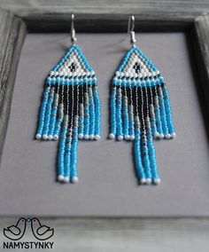 These azure fringe beaded earrings are made of high-quality Czech beads and strong synthetic thread. They are elegant, fashionable, and highly versatile, suitable for everyday wear. Features: Sterling silver components Color: gray, blue, white Length (approximate): 10 cm (3.93 in) This item is currently in stock. You must be completely satisfied. If you find merchandise unsatisfactory for any reason, return it within 10 days and your money will be refunded without questions. More beaded earrings Blue Fringe Dangle Chandelier Earrings, Blue Tassel Earrings With Round Beads, Blue Fringe Drop Earrings, Blue Beaded Tassel Dangle Earrings, Blue Tassel Earrings With Dangling Beads, Blue Fringe Beaded Drop Earrings, Blue Fringed Beaded Drop Earrings, Blue Beaded Fringe Dangle Earrings, Blue Dangle Earrings With Beaded Fringe