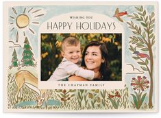 a happy holiday card with an image of a mother holding her son