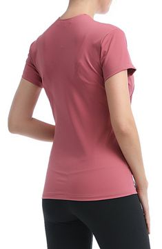 Gathered at the sides, this stretchy jersey top is bump-friendly and features a surplice V-neck that makes nursing easy once baby arrives. 25" length Surplice V-neck Short sleeves 88% nylon, 12% spandex Machine wash, tumble dry Imported Pink V-neck Athleisure Top, Pink Moisture-wicking T-shirt, Pink V-neck Workout Tops, Nursing Top, Nursing Tops, Maternity Nursing, Jersey Top, Fashion Advice, Bump