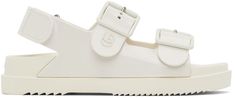 Rubber sandals in off-white. · Interlocking double G logo at vamp · Adjustable pin-buckle straps at vamp · Rubberized logo at vamp · Adjustable Velcro slingback strap · Molded rubber footbed · Logo embossed at rubber midsole · Treaded rubber outsole Supplier color: Dusty white | Gucci Off-White Double G Flat Sandals Double G Logo, Gucci Clothing, Gucci Outfits, G Logo, Rubber Sandals, Buy Gucci, Embossed Logo, Luxury Streetwear, Flat Sandals