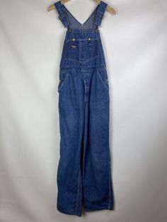 ad eBay - Find many great new & used options and get the best deals for OshKosh B’gosh Vintage men’s workwear denim bib overall size ~ M at the best online prices at eBay! Free shipping for many products! Utility Style Dark Wash Denim Jumpsuit With Bib Front, Dark Wash Utility Denim Jumpsuit With Bib Front, Utility Bib Front Bottoms In Medium Wash, Denim Blue Bib Front Shortalls With Pockets, Medium Wash Bib Front Utility Bottoms, Workwear Jeans With Bib Front And Pockets, Workwear Bib Front Jeans With Pockets, Workwear Bib Front Jeans, Denim Blue Utility Overalls With Bib Front