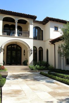 a large white house with lots of windows