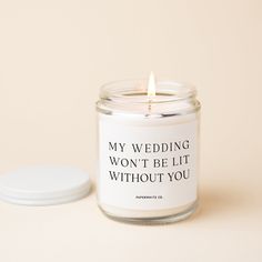 a candle that says i can't say i do, with a white lid