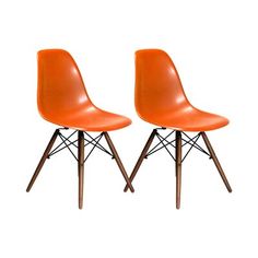 pair of orange plastic chairs with wooden legs