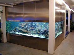 a large aquarium in the middle of a building