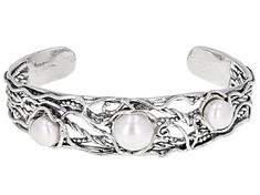 8-10mm white cultured freshwater pearl sterling silver adjustable cuff bracelet. Measures approximately 9/16" W and has no clasp closure. Colors, shapes, and sizes may vary. Elegant Adjustable Pearl Bracelet For Spring, Yellow Watches, School Jewelry, Jewelry Clasps, Popular Jewelry, Sterling Silver Cuff Bracelet, Pearl Types, Sterling Silver Cuff, Silver Cuff Bracelet