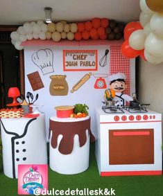 an ice cream parlor is set up with balloons and decorations on the grass for a birthday party