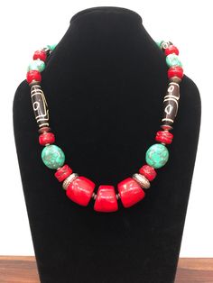 Beautiful Tibetan Design Necklace. Made out of resin, Turquoise stone, Dzi looking resin beads and brass metal beads. Authentic Tibetan Design Necklace. Length of Necklace :- 11 inch. Turquoise Jewelry With Round Wooden Beads, Colorful Round Beaded Resin Jewelry, Spiritual Red Coral Necklaces With Large Beads, Spiritual Red Coral Necklace With Large Beads, Bohemian Red Coral And Wooden Beads, Turquoise Necklace With Wooden Beads, Turquoise Necklaces With Round Wooden Beads, Turquoise Necklace With Wooden Round Beads, Turquoise Necklace With Round Wooden Beads