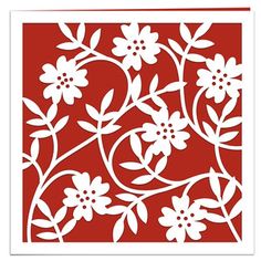 a red and white paper cutout with flowers on the bottom, in an ornate pattern