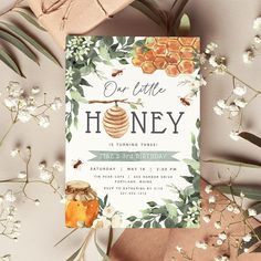 a wedding card with flowers and bees on it