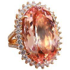 Split Shank Morganite Halo 33.18ct. Natural Orangy Pink Morganite & 3.00ct. diamonds ring. GIA Certified Report ID: 5161980467 27.46 X 16.63 X 11.14mm Full cut Oval brilliant Clean Clarity & Transparent 3.00ct. Diamonds. Rounds Full cuts G-color Vs-2 clarity. 18kt. rose gold 21.5 grams Ring Current size: 8 (Free Resize Service, Please inquire) Deck of Ring: 32.9 x 24mm Depth: 14mm $60,000 Appraisal Certificate to accompany & GIA Certificate. Heart Halo Ring, Morganite Diamond Ring, Pink Emerald, Diamond Bracelet Design, Pink Diamond Ring, Morganite Diamond, Ruby Diamond Rings, Modern Engagement Rings, Rose Orange