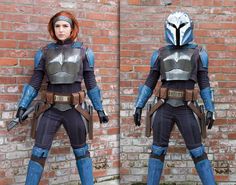 a woman in a star wars costume standing next to a brick wall