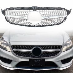 the front grille of a white mercedes s - class