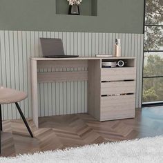 a computer desk with a laptop on top of it next to a chair and window