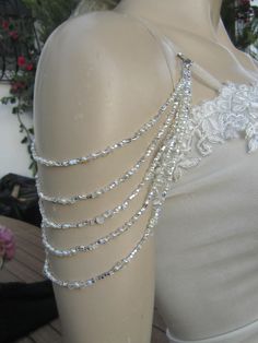 Handmade item Shoulder Necklace Bridal shoulder necklace 2 pieces per order. handcrafted Crystal Detachable Strap made to order Please get in touch for more information. Thank you so much for choosing my store. It is very importent to let my customers happy, so dont hesitate to contact me for your questions. Standart shipping I ship from Turkey , General delivery durations are USA : 12 /20 days Canada : 10/20days Australia: 15/25 days Shoulder Necklace Wedding, Pearl Shoulder Jewelry, Pearl Shoulder Necklace, Beaded Clothes, Shoulder Beads, Wedding Dress Straps, Shoulder Accessories, Straps Wedding Dress, Beaded Sleeves