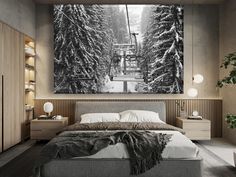 a bed room with a large painting on the wall and a chair lift above it