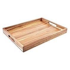 a large wooden tray with handles on the top and bottom, is shown in front of a white background