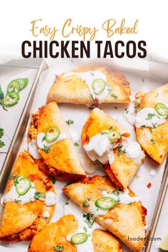 easy crispy baked chicken tacos on a tray