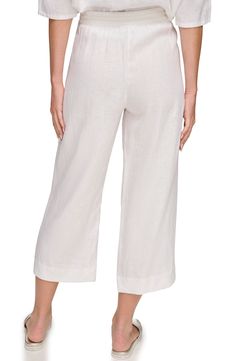 Kick back in casual-cool style in lightweight linen pants topped with a drawstring waist and cut to a cropped length. 24" inseam; 21" leg opening; 13" front rise; 16 1/2" back rise (size Medium) Elastic/drawstring waist Side-seam pockets 100% linen Machine wash, tumble dry Imported Comfortable Linen Wide Leg Summer Pants, Comfortable Linen Wide Leg Pants For Summer, Spring Linen Wide Leg Pants With Pull-on Style, Casual Linen Ankle-length Capris, Wide Leg Relaxed Fit Summer Capris, Summer Wide Leg Relaxed Fit Capris, Wide Leg Relaxed Fit Capris For Summer, Wide-leg Summer Capris, Casual Wide-leg Summer Capris