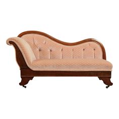 an old style chaise lounge with antlers on it