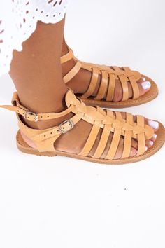 Greek Sandals, Leather Sandals, Gladiator Classic Greek Sandals, Gold Gladiators, Strap Sandals, Black Gladiator Shoes, Boho Sandals, OLYMPE OLYMPE SANDALS Gladiator Leather sandals with straps Natural colour  Handmade sandals Leather straps and insole Rubber anti-slippery outsole All our sandals are inspired from the ancient grecian style and are made of the finest greek leather. Each pair is handmade by the most experienced craftsmen using the traditional greek techniques to ensure elegance and durability. Genuine leather can present small imperfections and variations of colour due to the nature of the material. That adds uniqueness on every pair. Leather is a flexible, breathable material.  Note that natural leather darkens with time. DHL EXPRESS WORLDWIDE  FAST AND RELIABLE SHIPPING 1- Closed Toe Footbed Sandals With Adjustable Strap For Vacation, Summer Vacation T-strap Footbed Sandals, Beach Toe Ring T-strap Sandals With Buckle Closure, Open Toe T-strap Sandals For Vacation, Closed Toe T-strap Sandals With Buckle For Vacation, Vacation T-strap Closed Toe Sandals With Buckle, Summer Closed Toe Sandals With Heel Strap, Beach Sandals With Strap And Round Toe, Strap Sandals With Round Toe For Beach