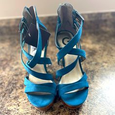 Guess Wedge Scandals Never Worn Nwt Blue Wedge Heel Sandals With 4-inch Heel, Blue Synthetic Wedge Sandals With Block Heel, Blue Cushioned Ankle Strap Wedge Sandals, Blue Wedge Sandals With Cushioned Footbed, Blue Synthetic Wedge Sandals With Heel Strap, Blue Wedge Heels With Cushioned Footbed, Chic Blue Wedge Sandals With Block Heel, Guess Shoes, Scandal