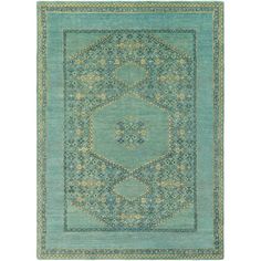 a blue rug with an intricate design on the center and sides, in various colors