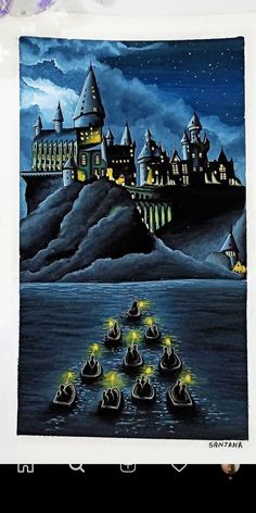 a painting of hogwart's castle at night