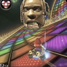 an image of a video game with a man on the track and fireworks in the background