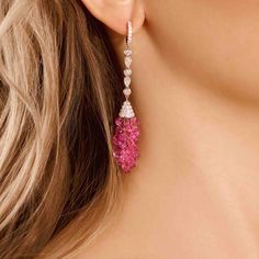 These fun earrings in 18 karat white gold contain briolette cut pink sapphires totaling 55.52 carats with 3.45 total carats of round and pear cut diamonds. Reference Code: 24234 Shop other beautiful pieces in our Earring Collection. For inquiries on the piece please contact: boutique@shsilver.com. Sapphire And Diamond Earrings, Pear Cut Diamond, Earring Collection, Tassel Jewelry, Diamond Drop Earrings, Earrings Collection, Fun Earrings, Pear Cut, Tassel Earrings