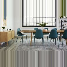 a dining room table with blue chairs in front of a large window