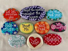 six magnets with words on them and hearts in the middle one says,'forget the music, remember the lesson, trust me,