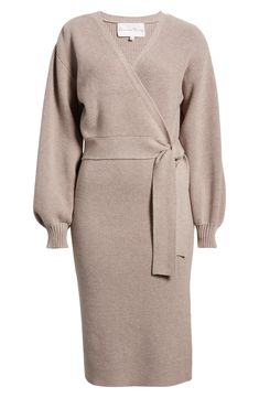 This faux-wrap sweater-dress knit with soft ribbing features a sultry dipped neckline and waist-cinching sash. 40" length (size medium) Surplice V-neck Long sleeves with ribbed cuffs Attached waist tie 50% viscose, 28% polyester, 22% nylon Hand wash, dry flat Imported Flattering Fall Dresses, Best Sweater Dress, Sweater Dress Family Photos, Fall Work Dresses For Women, Long Dress With Boots Winter, Fall Fitted Wrap Dress With Surplice Neckline, Winter Brown Belted Dress, Fitted V-neck Sweater Dress For Loungewear, Fitted Faux Wrap Dresses For Fall