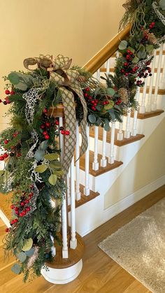 christmas garland on the banisters with holly and berries