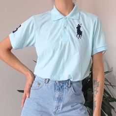 Vintage 90s Ralph Lauren Baby Blue Polo T-Shirt 🍒Excellent vintage condition 🍒Size EU40.L; UK12/L 🍒Seen on the model size S; 5'11 🌺Measurement upon request 🌺Shipping from Lithuania , with tracked priority shipping. Takes up to 12 days depending on your location 🌺Any questions please message me Vintage Summer Polo Collar T-shirt, Vintage Blue Collared T-shirt, Light Blue Short Sleeve Polo Shirt For Summer, Casual Polo Collar Top With Graphic Print, Casual Blue Polo Collar T-shirt, Light Blue Cotton Polo Shirt For Summer, Vintage Summer Polo T-shirt, Vintage Polo Collar T-shirt For Summer, Vintage Summer T-shirt With Polo Collar