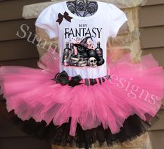 A stunning, pink and black tutu comes with fun, but spooky "In My Fantasy Era" black cat shirt.  A black satin bow is attached to the shirt and tutu.   *Long sleeve shirts are available upon request. All tutus are made with high quality tulle and a 1" non-roll waist band.  I make all my tutus very full and fluffy.  I put as much tulle as I can possibly fit.  The shirt is made with a professional heat press, NOT a home iron.  Personalization is included at no additional cost. Please note, heat pressed shirts may become distressed through wash/wear.  Always wash the shirt inside out on a delicate cycle. The puffy sleeve tee comes in sizes 12 month - size 12 . I also carry the same brand shirt in a tank top style as well as long sleeved.  I also have Carter's bodysuits in sizes newborn - 24 m Fitted Pink Costume For Halloween, Fitted Pink Halloween Costume, Pink Themed Costume For Costume Party, Pink Themed Costume For Party, Pink Themed Halloween Costume, Cute Black Tutu Dress, Cute Fitted Black Tutu Dress, Black Fitted Tutu Dress, Cute Style, Cute Halloween Tulle Tutu Dress