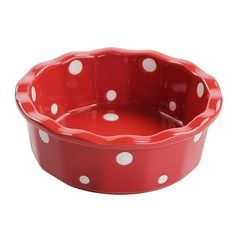 a red and white polka dot dog bowl on a white background with the lid down