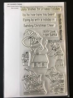 a clear rubber stamp with christmas scenes on it