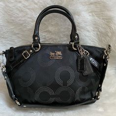 Coach 15935 Black Madison Dotted Op Art Sophia Shoulder Bag Satchel Handbag Hobo Item: 15935 Color: Sv/Black Op Art Fabric With Leather Trim Inside Zip And Multifunction Pockets Zip Top Closure, Fabric Lining Handles With 5" Drop Removable Strap With 9" Drop For Shoulder Wear Approximately: 14" L X 9" H X 4" W No Dust Bag Selling All My Authentic Unused / Brand New Collection. Got It Personally From The Official Store/ Website. From A Smoke Free Home. Follow Me On Instagram Joy_closet4u Luxury Coach Hobo Satchel Bag, Black Coach Satchel Shoulder Bag, Coach Black Satchel With Handle Drop, Coach Black Satchel With Removable Pouch, Coach Black Satchel With Detachable Handle, Coach Satchel Tote For On-the-go, Black Coach Satchel With Silver-tone Hardware, Coach Hobo, Coach Satchel