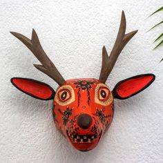 Handcrafted Wood Animal Mask Wall Sculpture - Orange Maya Deer | NOVICA Deer Mask, Mask Wall Decor, Paper Mache Mask, Ceramic Mask, Wood Mask, Animal Mask, Wall Decor Wood, Mask Wall, African Sculptures