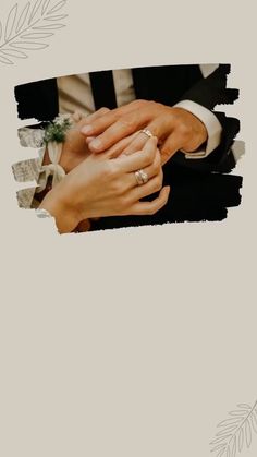 two people are holding hands with one person wearing a wedding ring and the other is holding an engagement ring