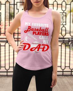 a woman wearing a pink tank top that says, my favorite baseball players call me dad