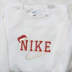 Introducing our Christmas Hat x Nike Embroidered Sweatshirt, the perfect blend of style and comfort for the festive season. Made Nike Embroidered Sweatshirt, Celebrity Shirts, Maroon Hoodie, Embroidery Sweatshirt, Hoodie Material, Christmas Hoodies, Sweatshirt Christmas, Embroidered Sweatshirt, Blue Sweatshirt