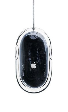 an apple computer mouse hanging from a cord