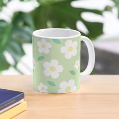 11oz ceramic mug featuring wraparound print. Available in two shapes. Dishwasher safe. Cute pattern of white flowers and leaves on a pastel green background. Pastel Green Background, Flower Pastel, Light Pastel Green, Cute Cottagecore, Green Mug, Green Pastel, Green Mugs, Aesthetic Coffee, Cottagecore Aesthetic