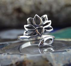 Sterling silver adjustable ring with lotus flower in sizes 5, 6, 7, 8, 9 Spiritual Lotus Flower Jewelry For Meditation, Handmade Adjustable Spiritual Flower Ring, Spiritual Sterling Silver Flower Ring, Spiritual Silver Adjustable Flower Ring, Adjustable Silver Spiritual Flower Ring, Adjustable Spiritual Silver Flower Ring, Lotus Flower Meaning, Lotus Flower Ring, Lotus Bud