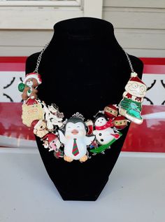 "My Mom and I made this statement necklace using broken jewelry pieces!  Holiday Christmas Necklace for that Christmas Fanatic!  It's a fun piece to wear and be totally into the spirit of the Holidays!  Repurposed statement bib necklace with silver tone metal chain.  **If you live outside the USA message me and I'll give you a shipping quote.** *Look us up on Facebook at:  \"Sparkle my Glitter\" to see all of our creations." Novelty Christmas Jewelry For The Holidays, Novelty Christmas Holiday Jewelry, Christmas Holiday Novelty Jewelry, Handmade Christmas Necklaces For Festive Occasions, Handmade Multicolor Christmas Jewelry, Handmade Vintage Jewelry For Holidays, Vintage Handmade Holiday Jewelry, Vintage Christmas Gift Necklaces, Vintage Necklaces For Christmas Gifts