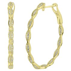 Elevate your look with these exquisite 0.55 Cttw Diamond Hoop Earrings in 18K Yellow Gold. Featuring a graceful, leaf curved design, these earrings are adorned with sparkling round diamonds, each with a dazzling GH color and SI1 clarity. Carefully cut in a single-cut style, the diamonds are set to maximize brilliance, adding a touch of luxury to your everyday ensemble. Crafted from premium 18K yellow gold, these oval-shaped hoops offer both durability and elegance. The earrings are secured with Modern Hoop Earrings, Gold Diamond Hoop Earrings, Sapphire And Diamond Earrings, White Gold Hoops, Pearl Hoop Earrings, White Gold Band, Princess Diamond, Diamond Hoop Earrings, Antique Earrings