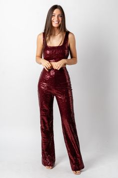 Sequin flare pants from Lush Fashion Lounge women's boutique in Oklahoma City. Lush boutique in OKC has a variety of cute Christmas and holiday apparel! Pair these sequin pants with the matching cop top, sold separately, for a trendy Christmas party look! Model is 5'7 size 25 wearing size small. 100% polyester 32in inseam PANTS ONLY. Top sold separate. Red Sequin Pants Outfit, Red Monochrome Outfit, Bling Outfits, Sequin Flare Pants, Red Monochrome, Sequin Pants, Holiday Apparel, Monochrome Outfit, Party Look